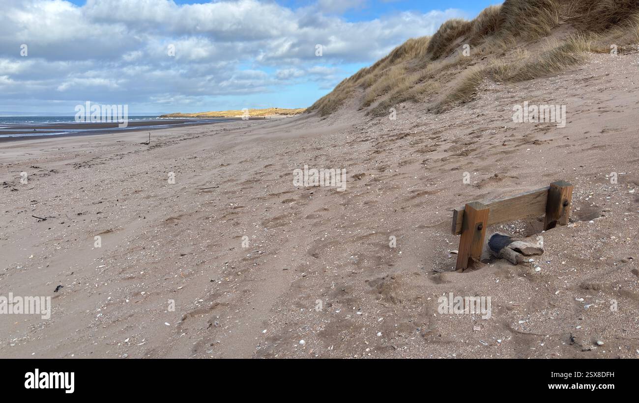 Aberlady Beach near Edinburgh in Scotland. Windswept beach on a bright Spring day. Light clouds, golden sand, sweeping coastline and sea shore - Smartphone Captured Stock Image