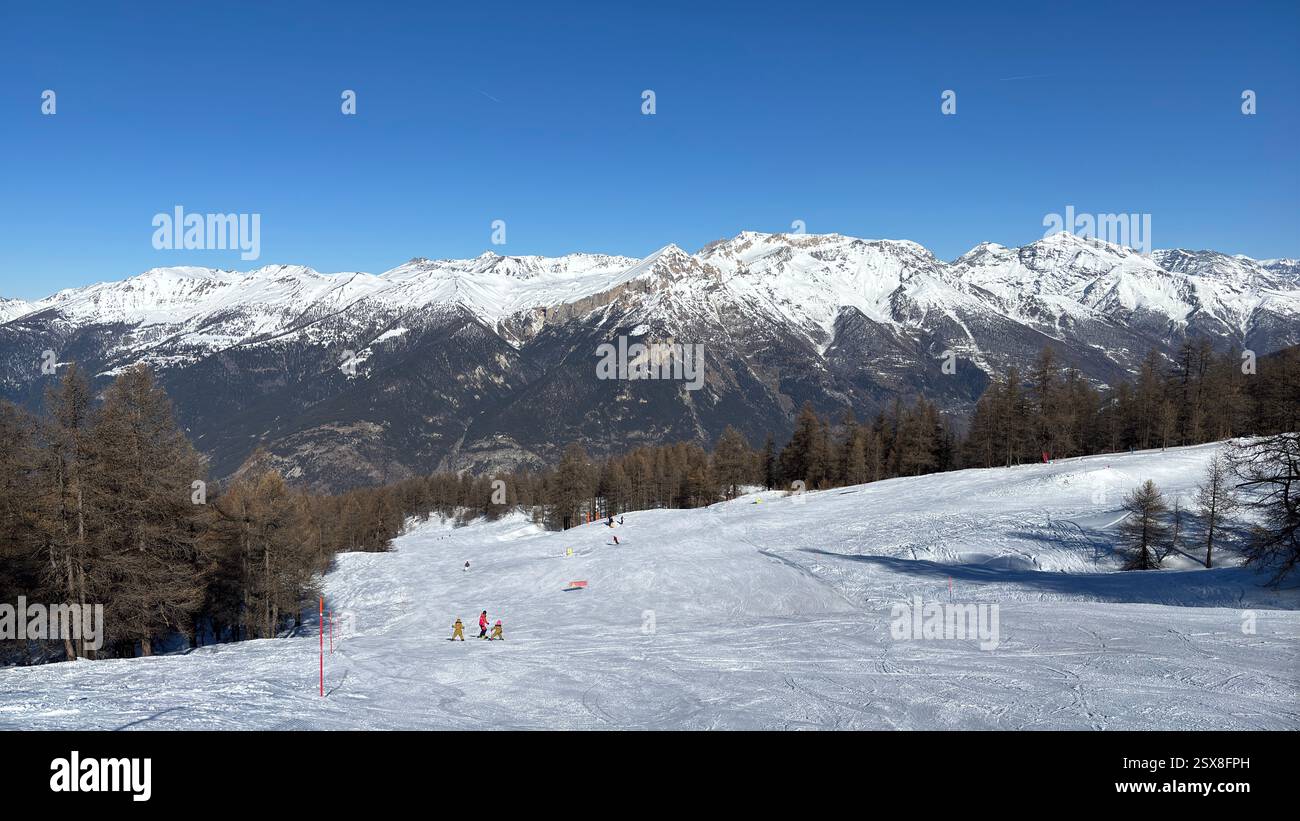 Piedmont Italy Sansicario. Ski resort snow and beautiful mountains. Alps. Alpine Mountain View skiing holiday travel outdoors beautiful winter landsca - Smartphone Captured Stock Image