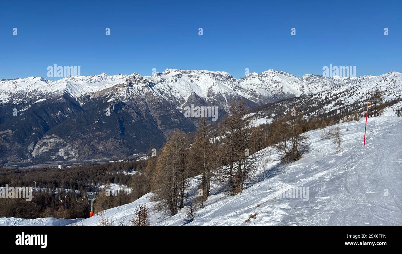 Piedmont Italy Sansicario. Ski resort snow and beautiful mountains. Alps. Alpine Mountain View skiing holiday travel outdoors beautiful winter landsca - Smartphone Captured Stock Image