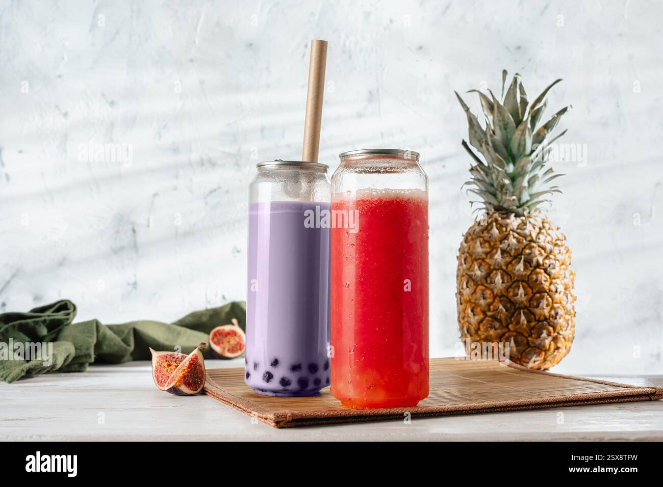 Bubble tea drink with taro taste with chewy tapioca pearls and poppings ...