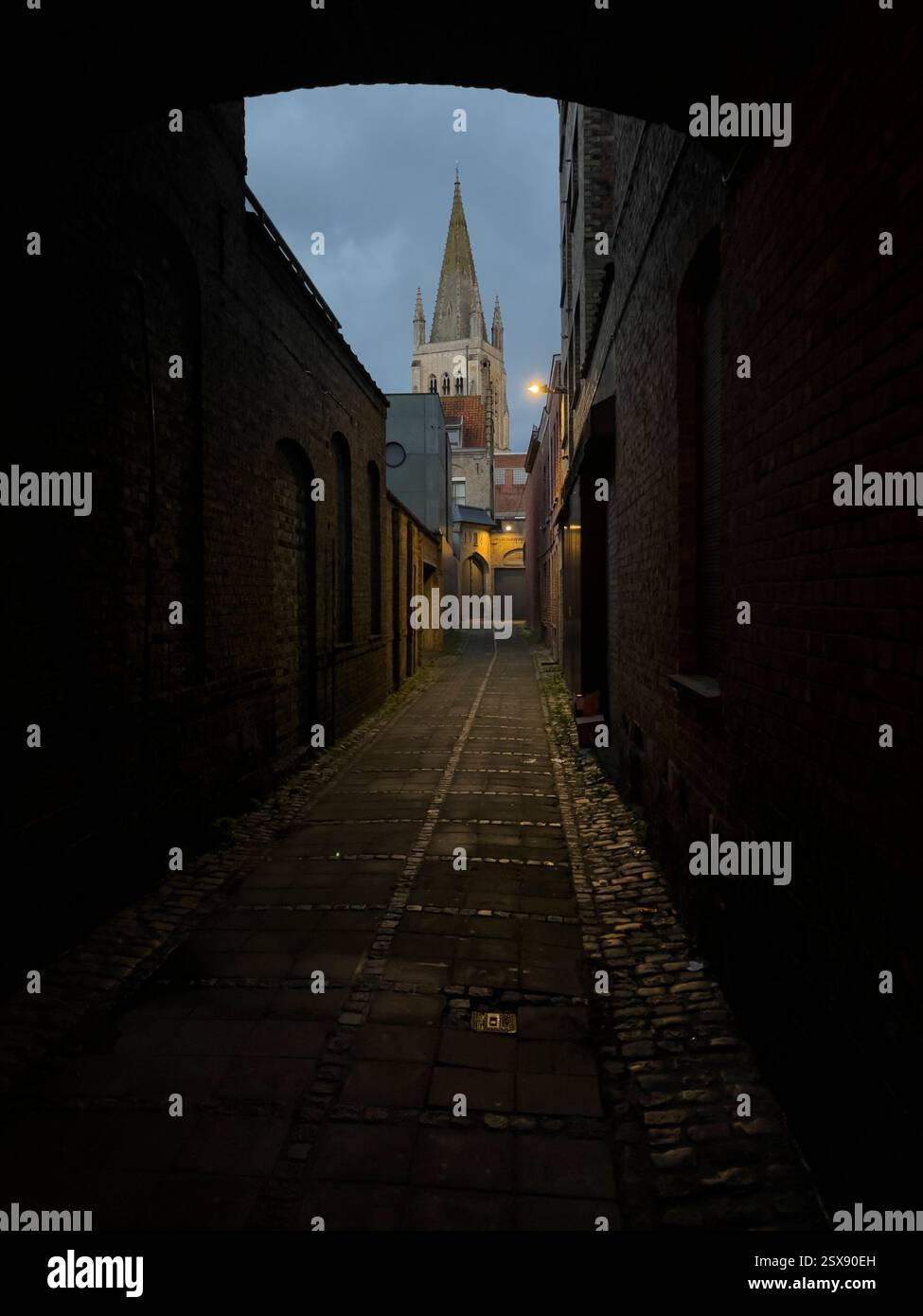 St George's Memorial Church, Ypres seen through one of the many town archways. - Smartphone Captured Stock Image