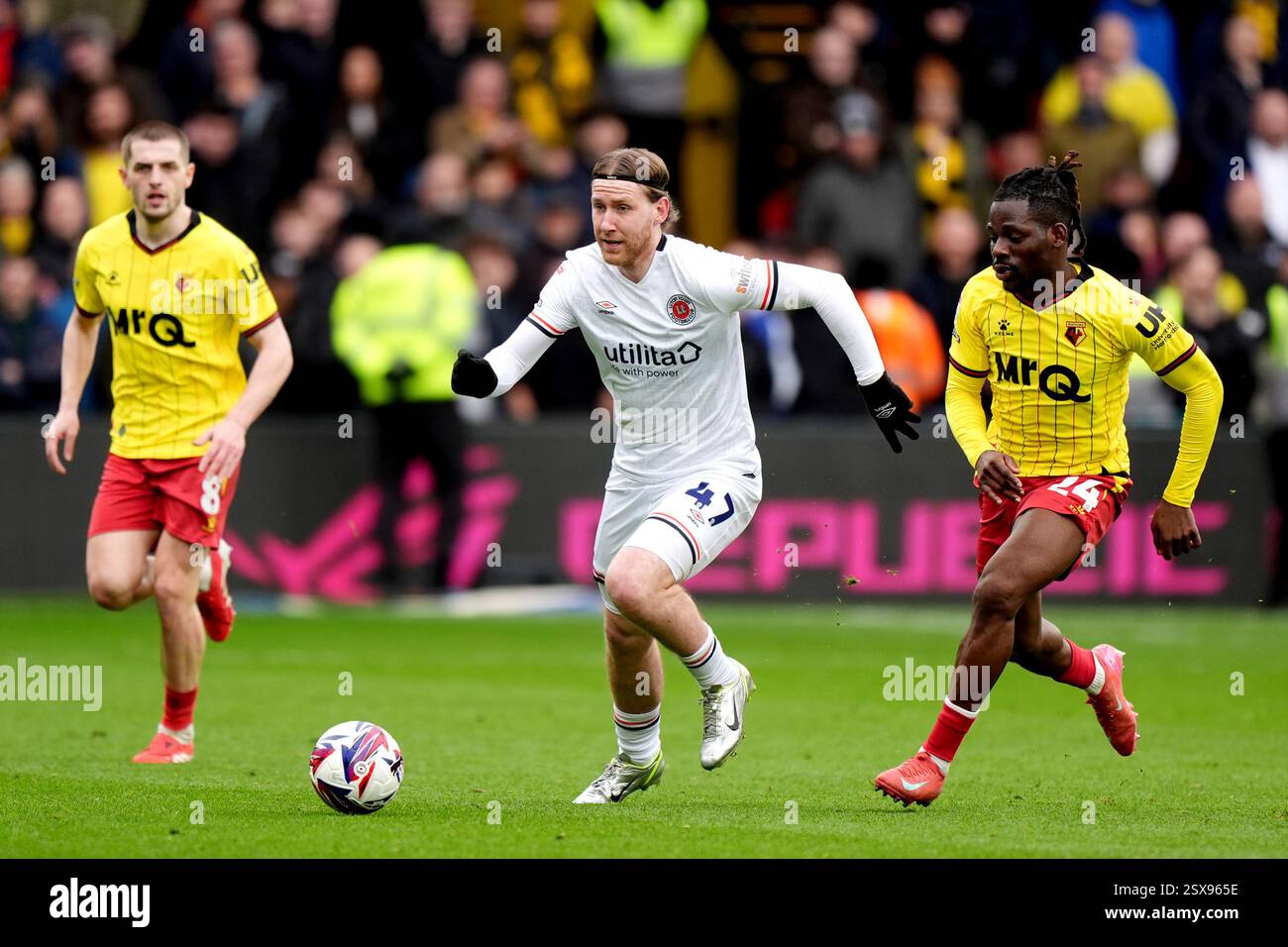 Luton Town's Josh Bowler battle for the ball with Watford’s Tom Dele ...