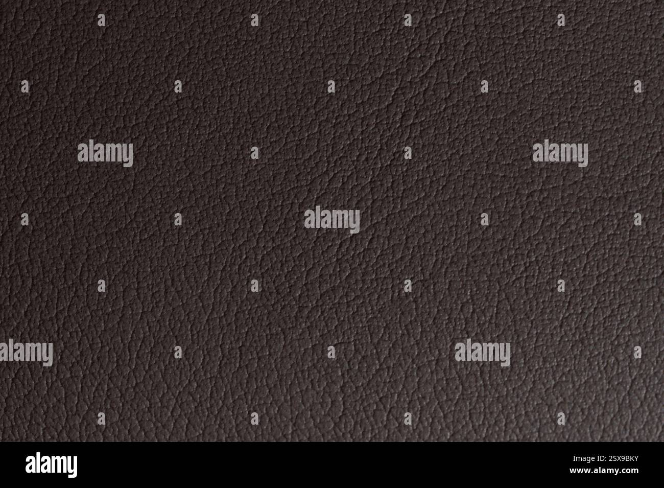 Brown bumpy leather background macro close up view Stock Photo