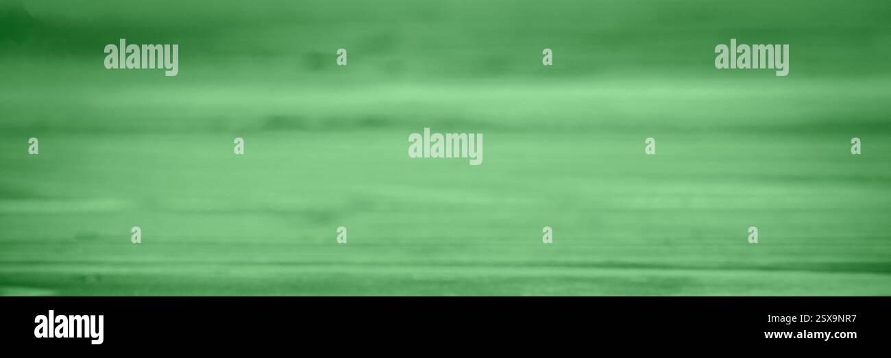 Abstract blurred green texture background with smooth gradients and ...