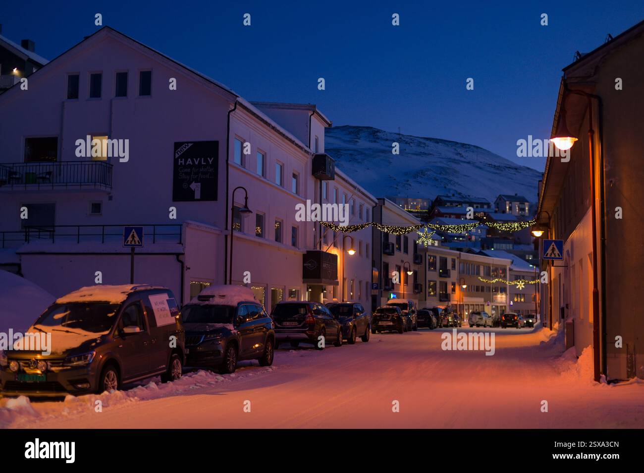 The main road through the city of Honningsvåg under polar night, Norway Stock Photo