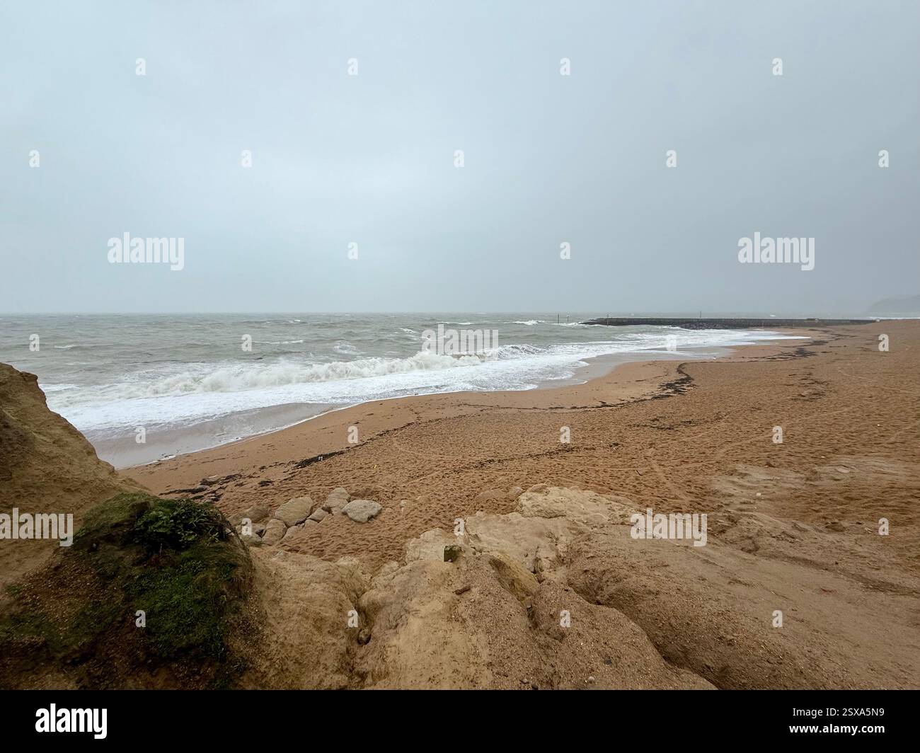 West Bay Beach and Pier from East Cliff on a Windy Day in February - Smartphone Captured Stock Image