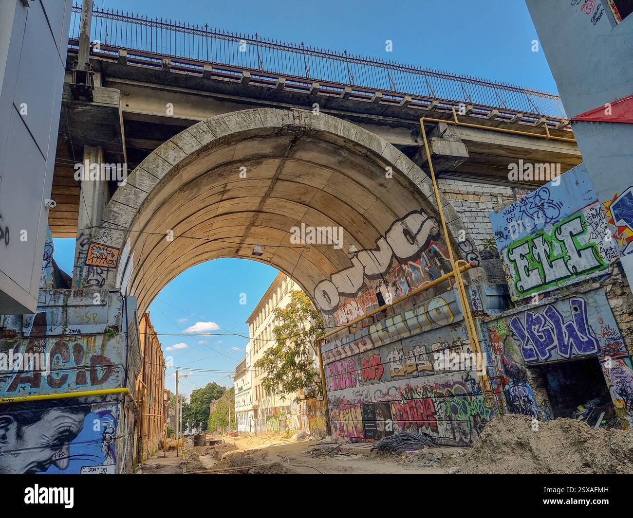 High historical stone bridge with graffiti: Stroganovsky bridge over  Devolanovskyi descent, former Karantinnaya street in Kanava area in Odesa/Odessa - Smartphone Captured Stock Image