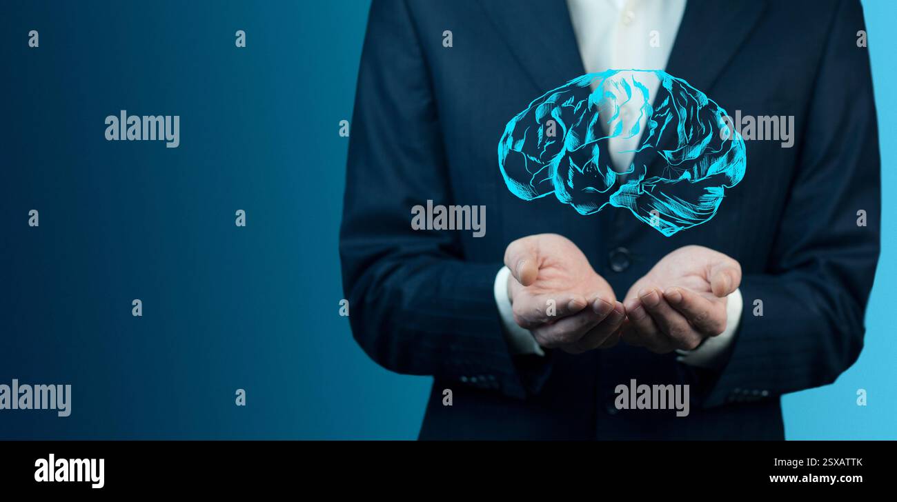 businessman holding digital image of brain in palm Stock Photo - Alamy