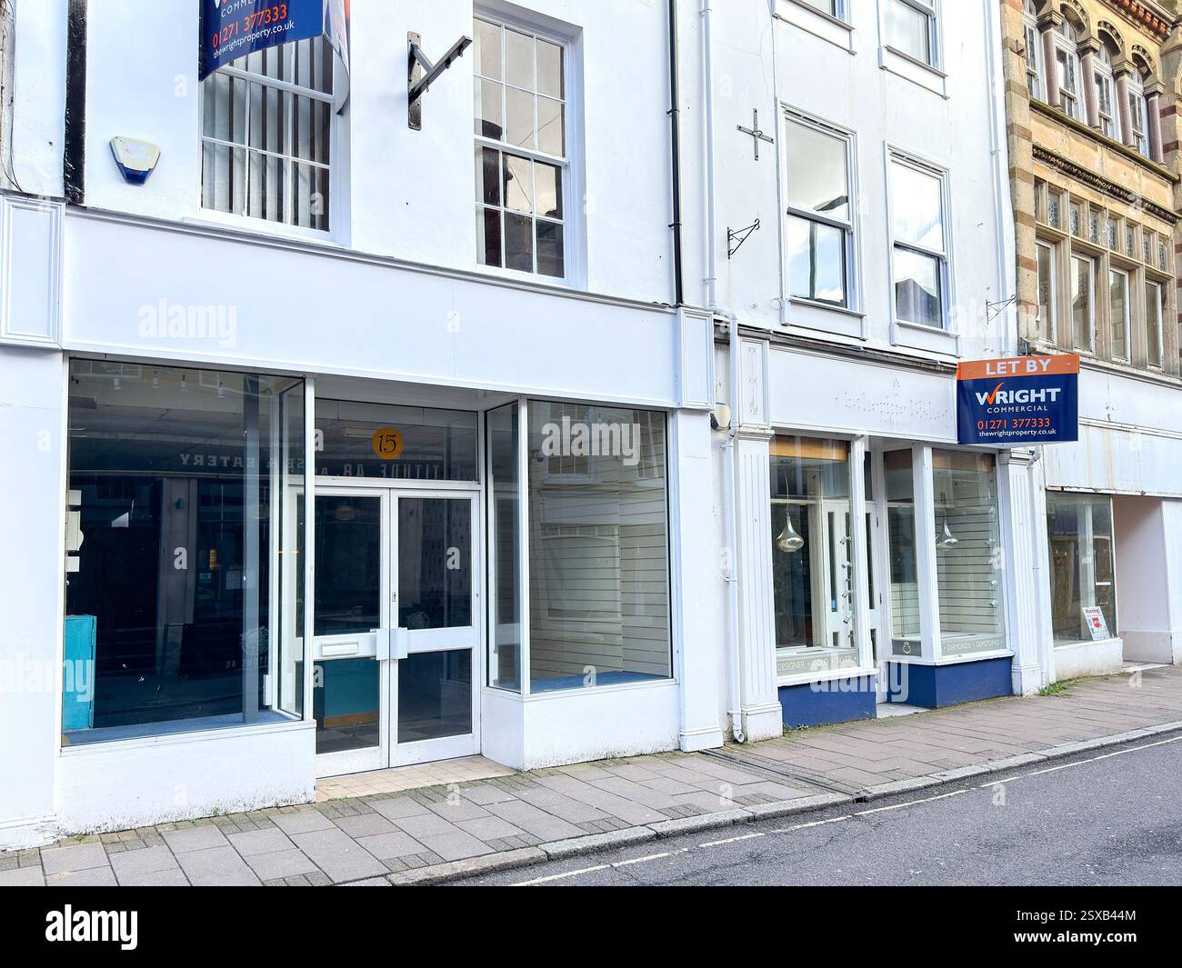 Barnstable, Devon, England, UK - 21 February 2025: Row of empty shops in the main street of the town centre of Barnstable. - Smartphone Captured Stock Image
