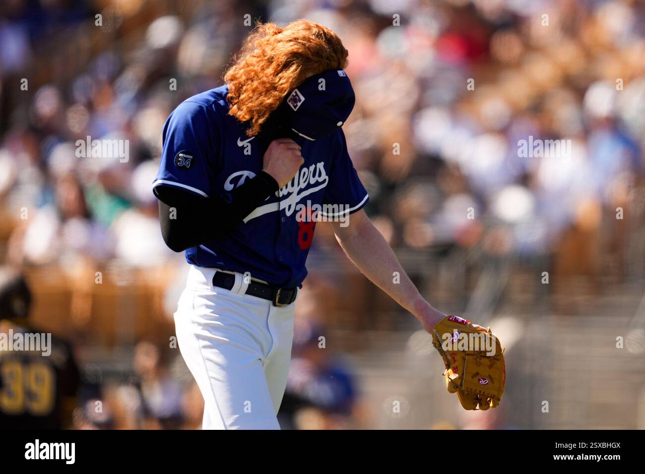 Dustin Spiring Image Los Angeles Dodgers starting pitcher Dustin May reacts after throwing ...