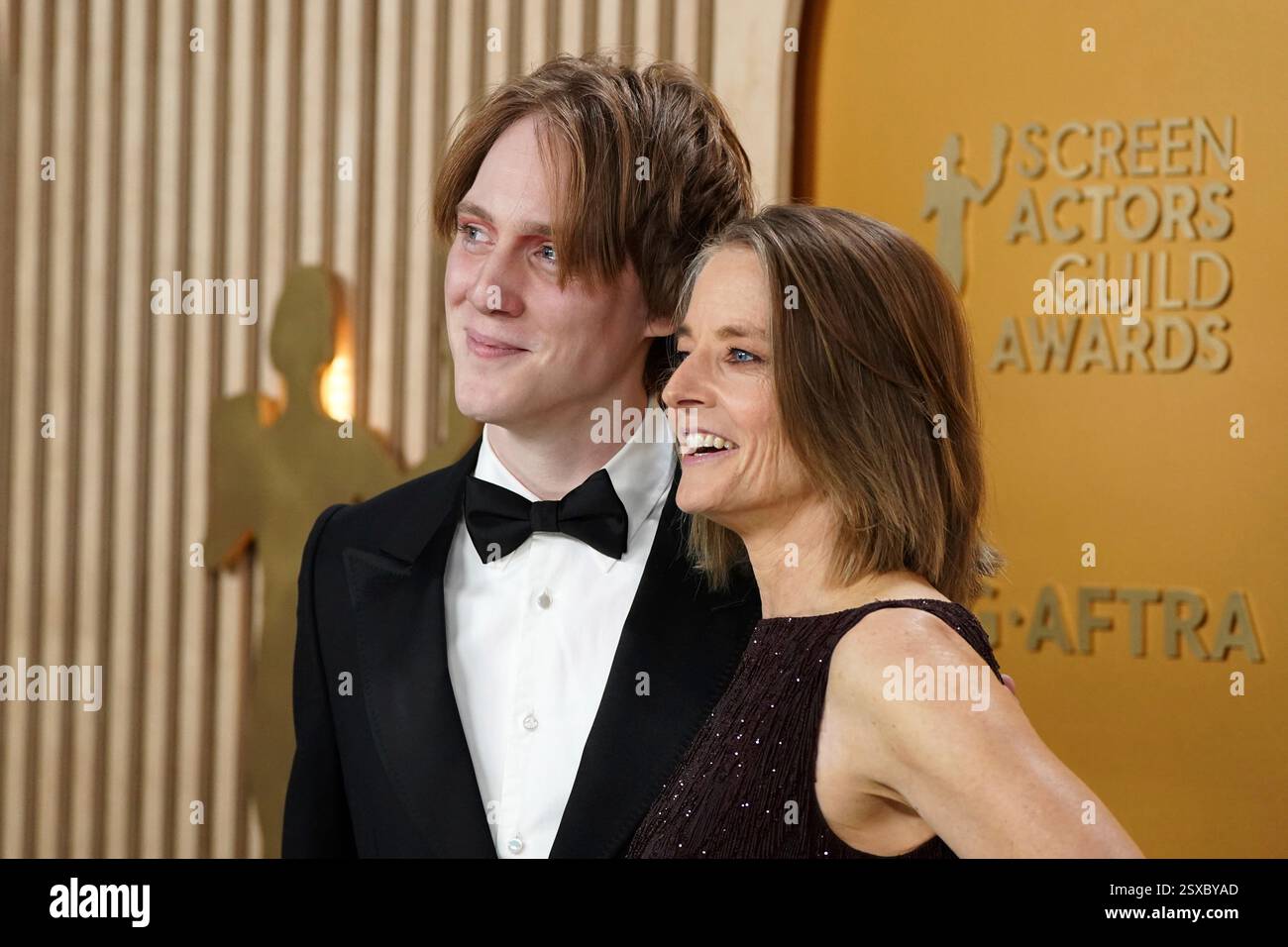 Christopher "Kit" Bernard Foster, left, and Jodie Foster arrive at the