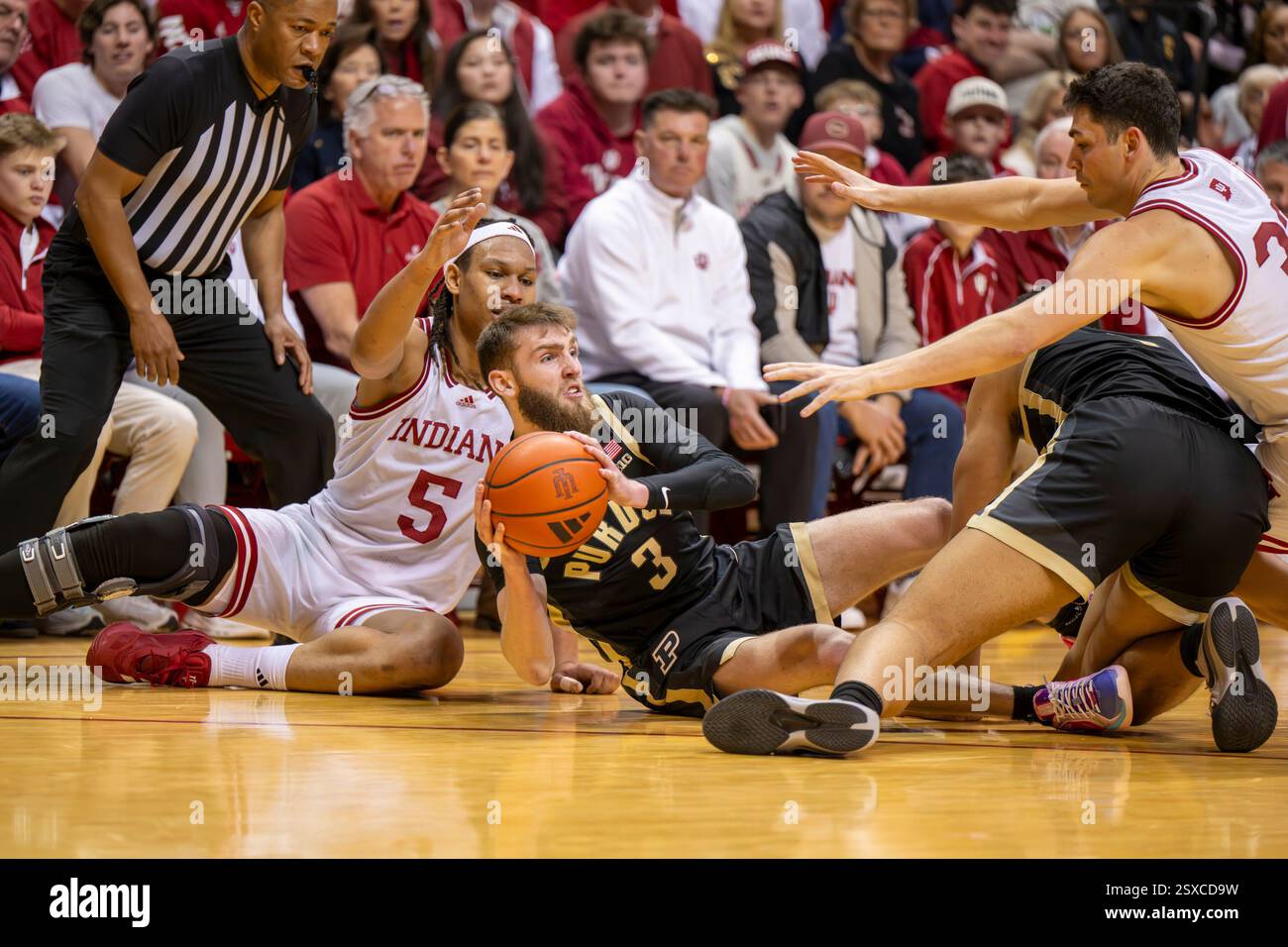 Purdue guard Braden Smith (3) looks to pass while being defended by ...