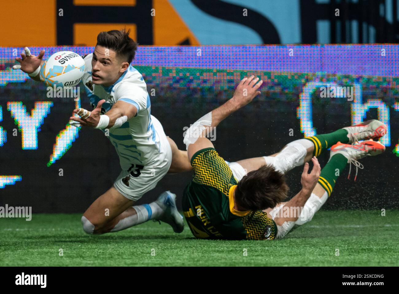 Argentina's Marcos Moneta vies for the ball as South Africa's Quewin ...