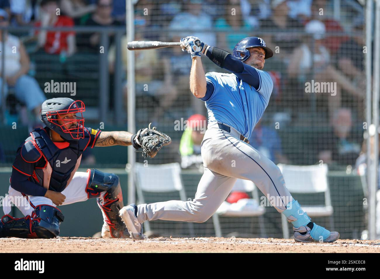 North Port, FL USA; Tampa Bay Rays catcher Ben Rortvedt (30) singles to ...