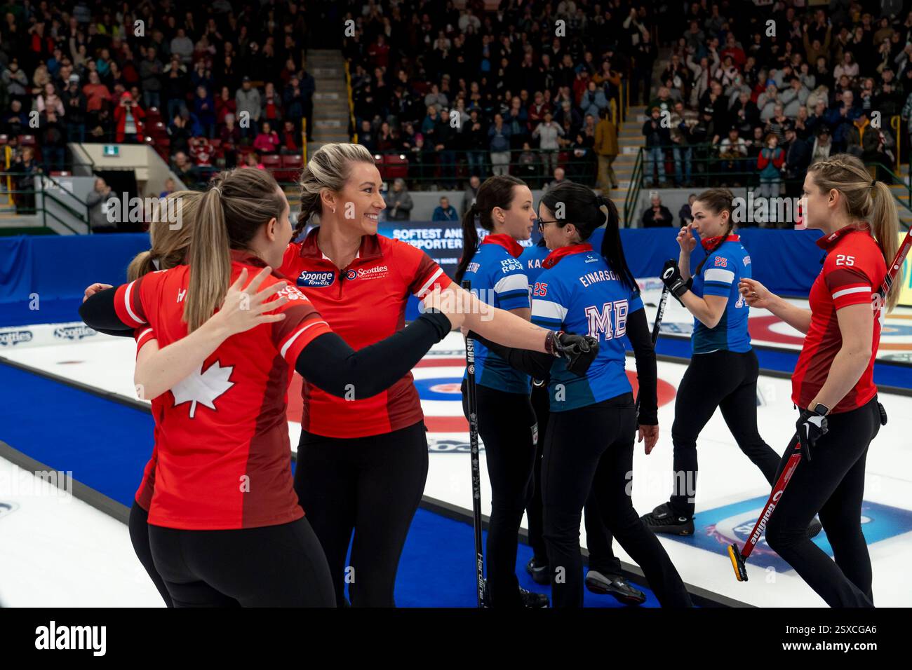 Team Canada skip Rachel Homan celebrates with her teammates after defeating Team Manitoba in the