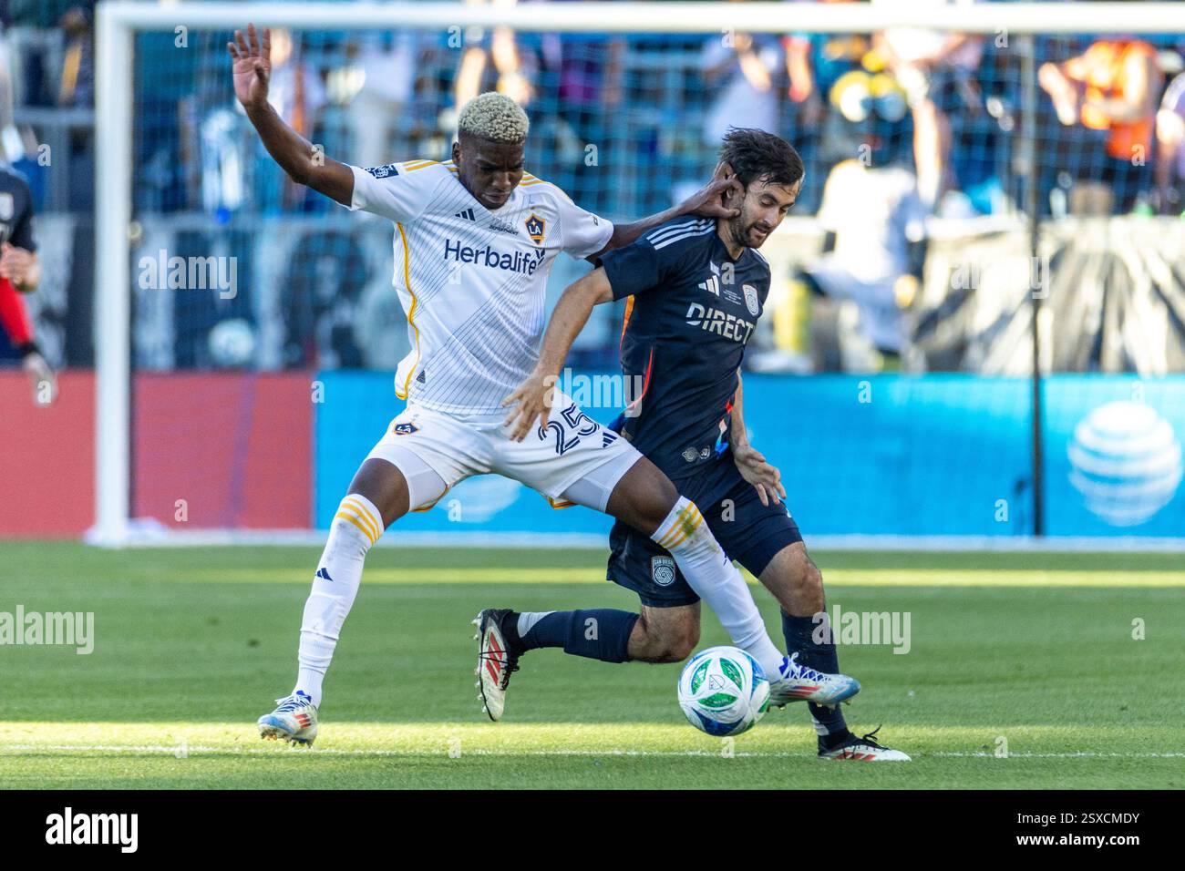 Diego Ringo LA Galaxy's Carlos Garcés #25 and San Diego FC's Luca de la Torre #14 ...