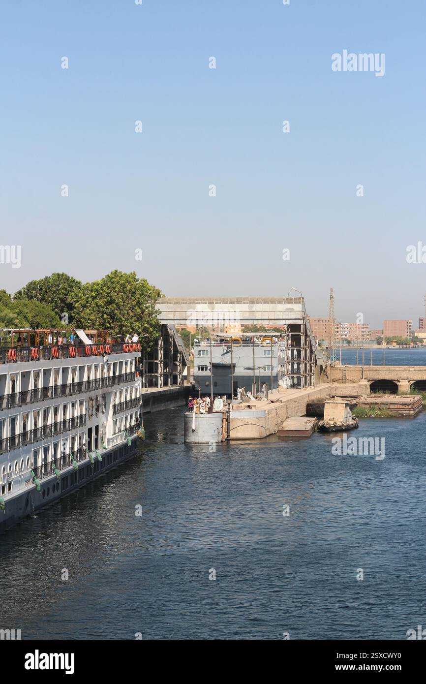 Esna, Egypt - October 21, 2023: Vendors display their goods for sale to cruise ship passengers at the Esna Lock on the River Nile Stock Photo