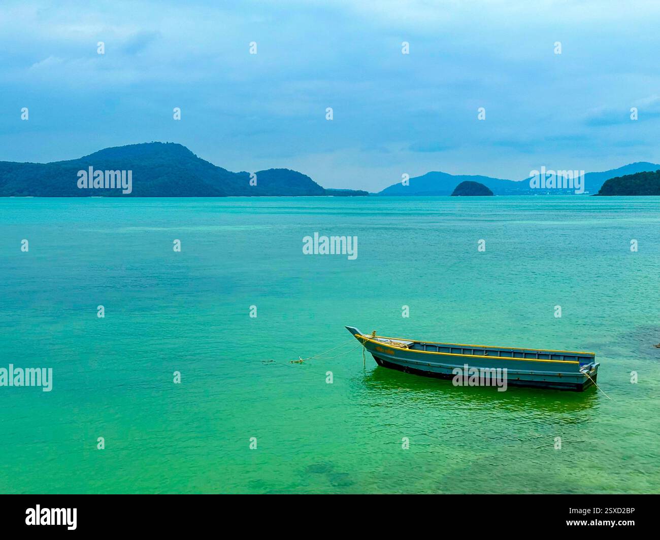 White and Yellow Boat Floating on the Turquoise-Green Waters of the Andaman Sea 2 - Smartphone Captured Stock Image
