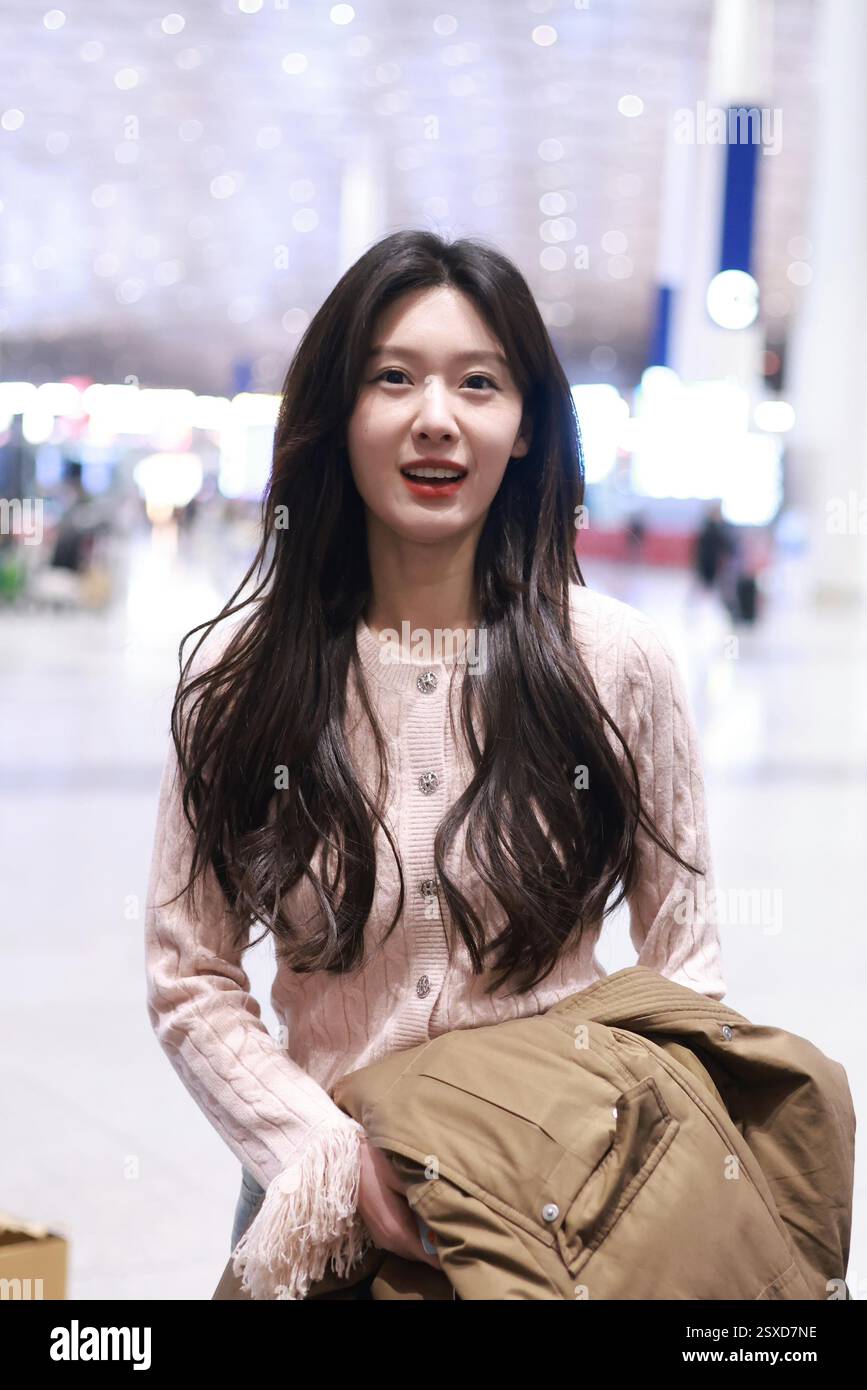 Chinese actress Wang Zixuan appears at the airport in Beijing, China ...