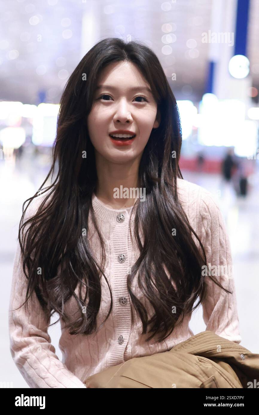 Chinese actress Wang Zixuan appears at the airport in Beijing, China ...