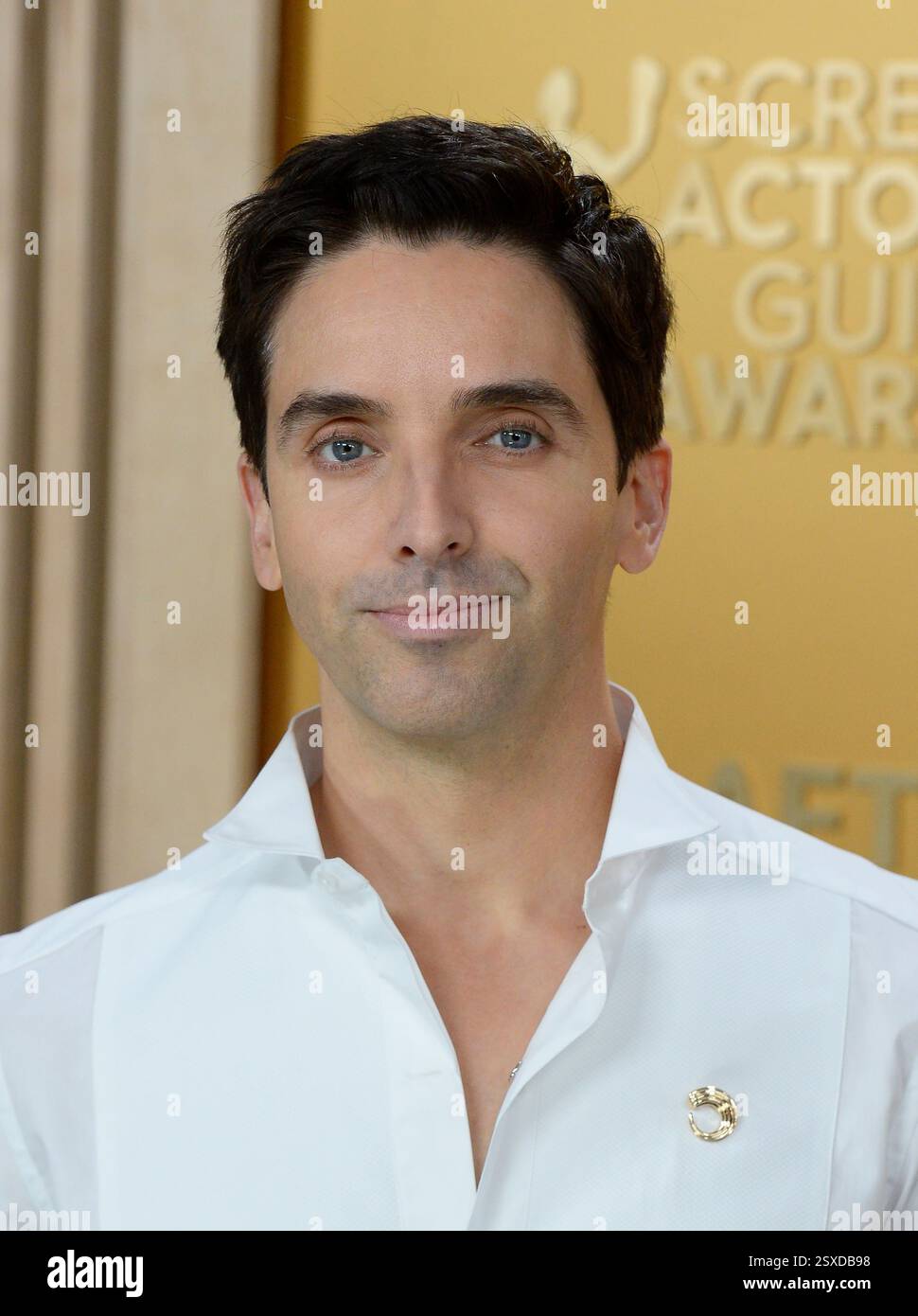 Paul W. Downs arriving at the 31st Screen Actors Awards held at the