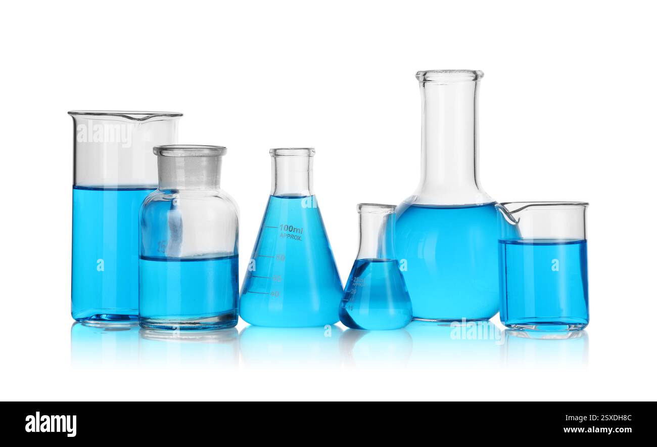 Laboratory glassware with blue liquid isolated on white Stock Photo - Alamy