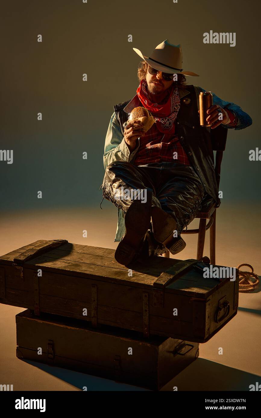 Cowboy holding hat to chest hi-res stock photography and images - Alamy