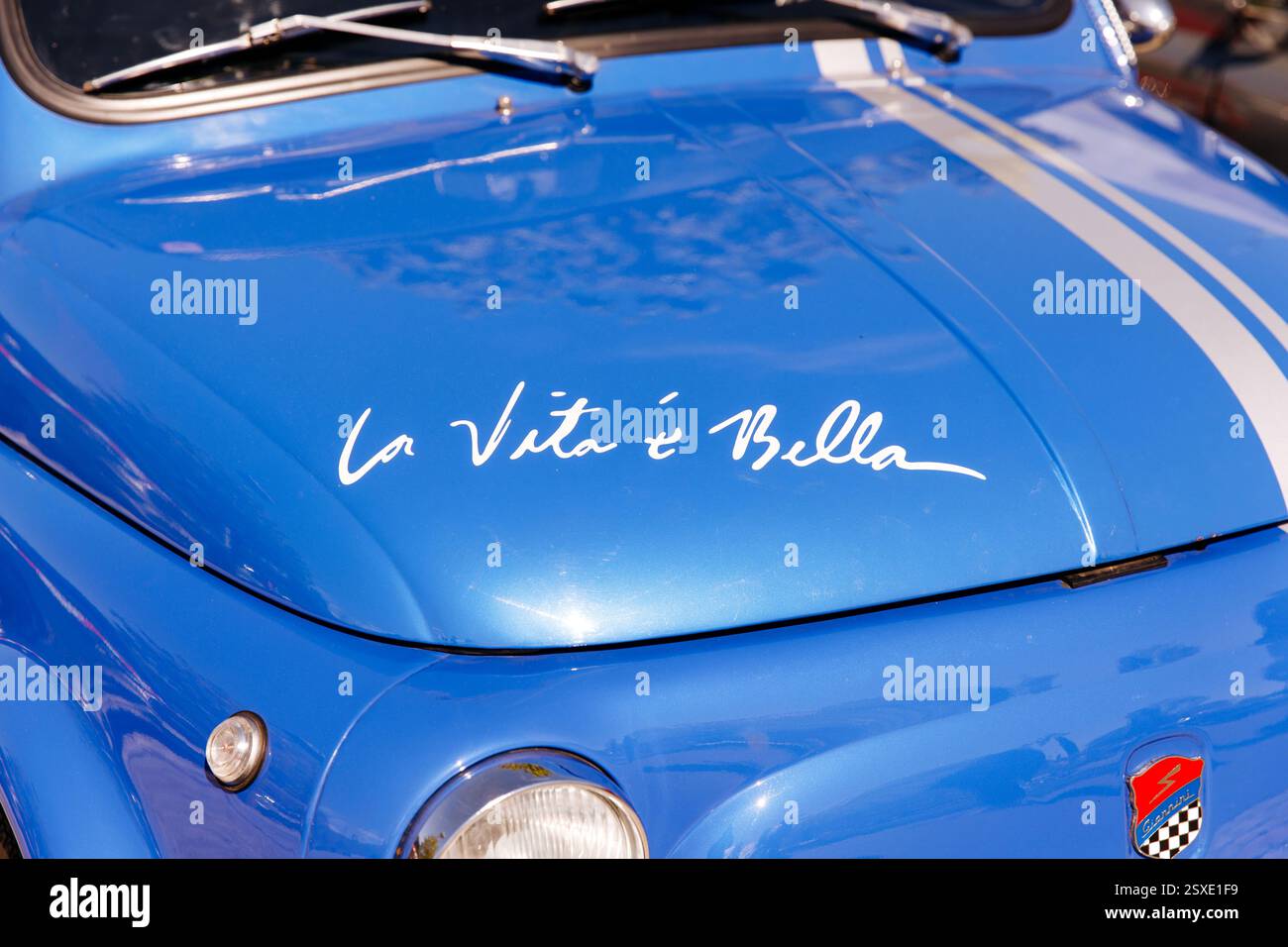 Vintage blue car with futuristic script on hood Stock Photo - Alamy