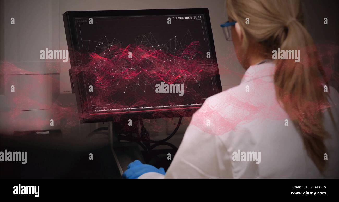 Image of data processing over caucasian female scientist using computer in laboratory Stock Photo