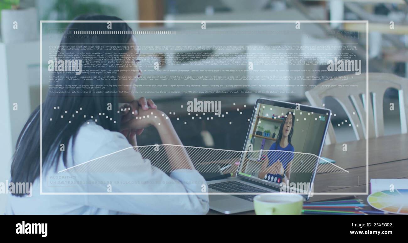 Image of data processing over biracial businesswoman using laptop for image call in office Stock Photo