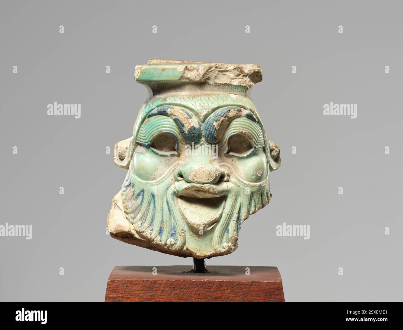 This faience head, part of a Bes jar, dates to Egypt's Late Period to ...