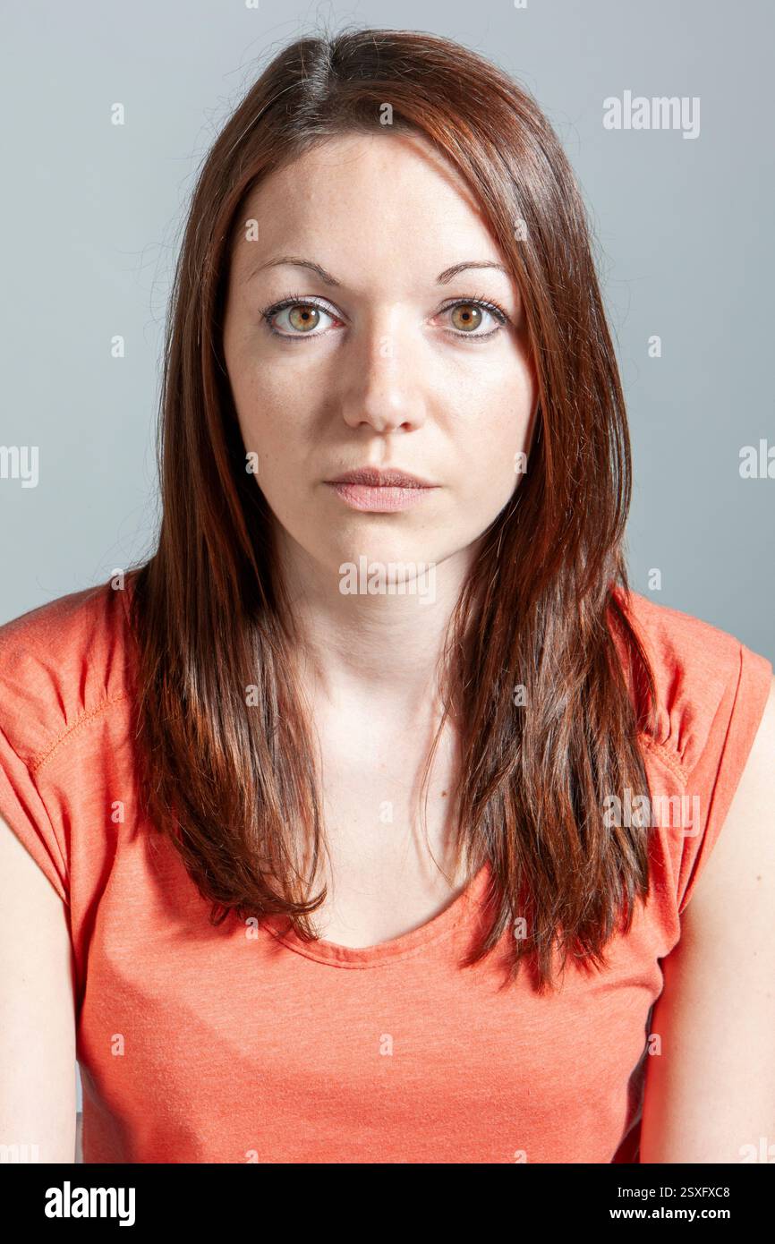 From a series of expressive portrait images of a young female model ...
