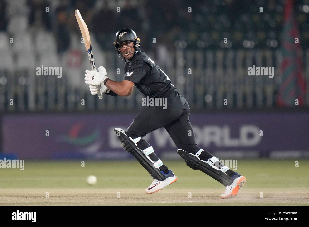 New Zealand's Rachin Ravindra plays a shot during the ICC Champions ...