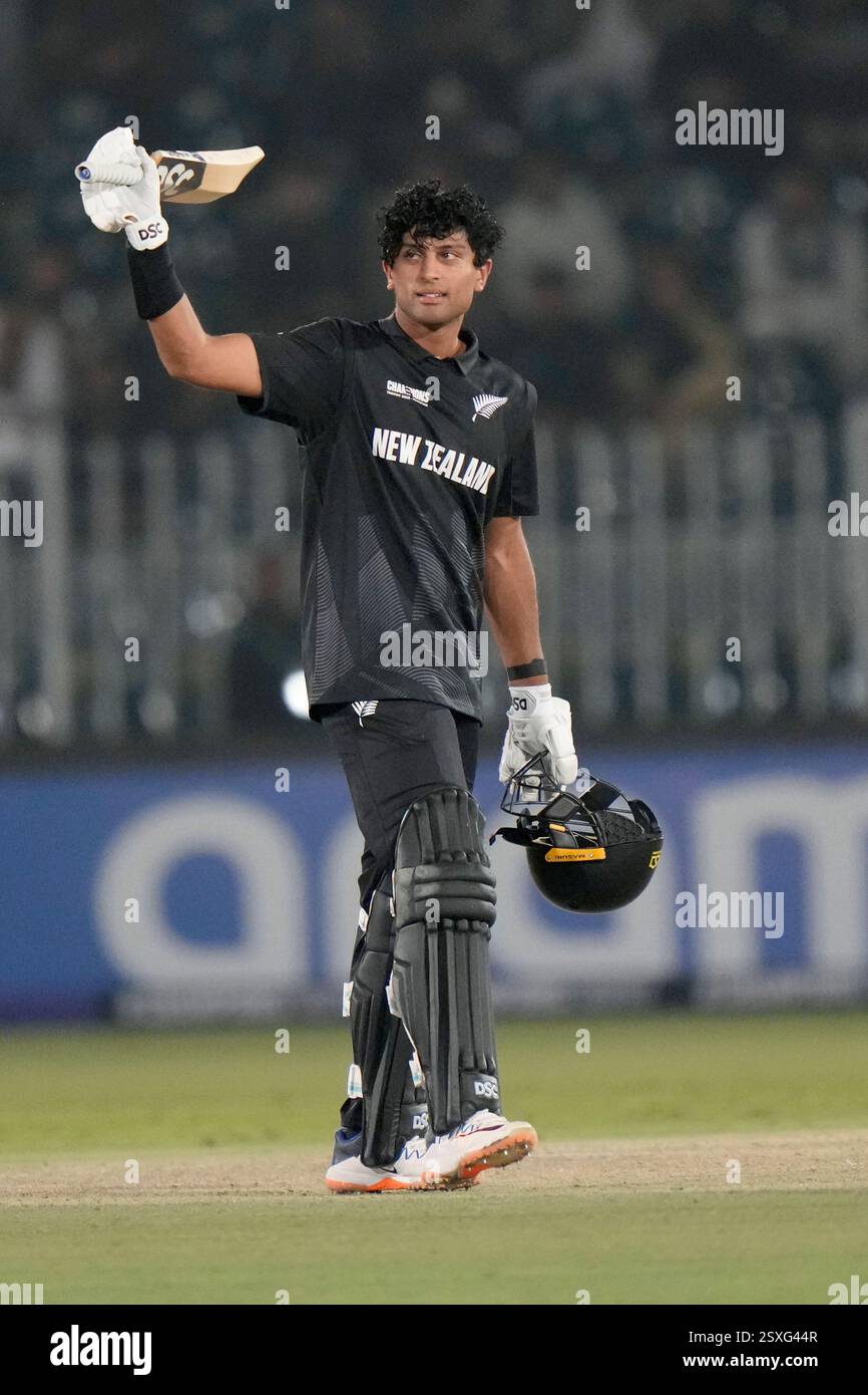 New Zealand's Rachin Ravindra celebrates after scoring century during ...