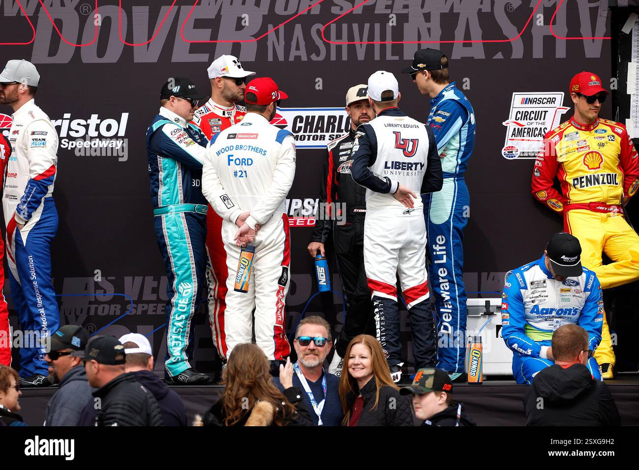 HAMPTON, GA - FEBRUARY 23: Drivers mingle behind the stage before ...
