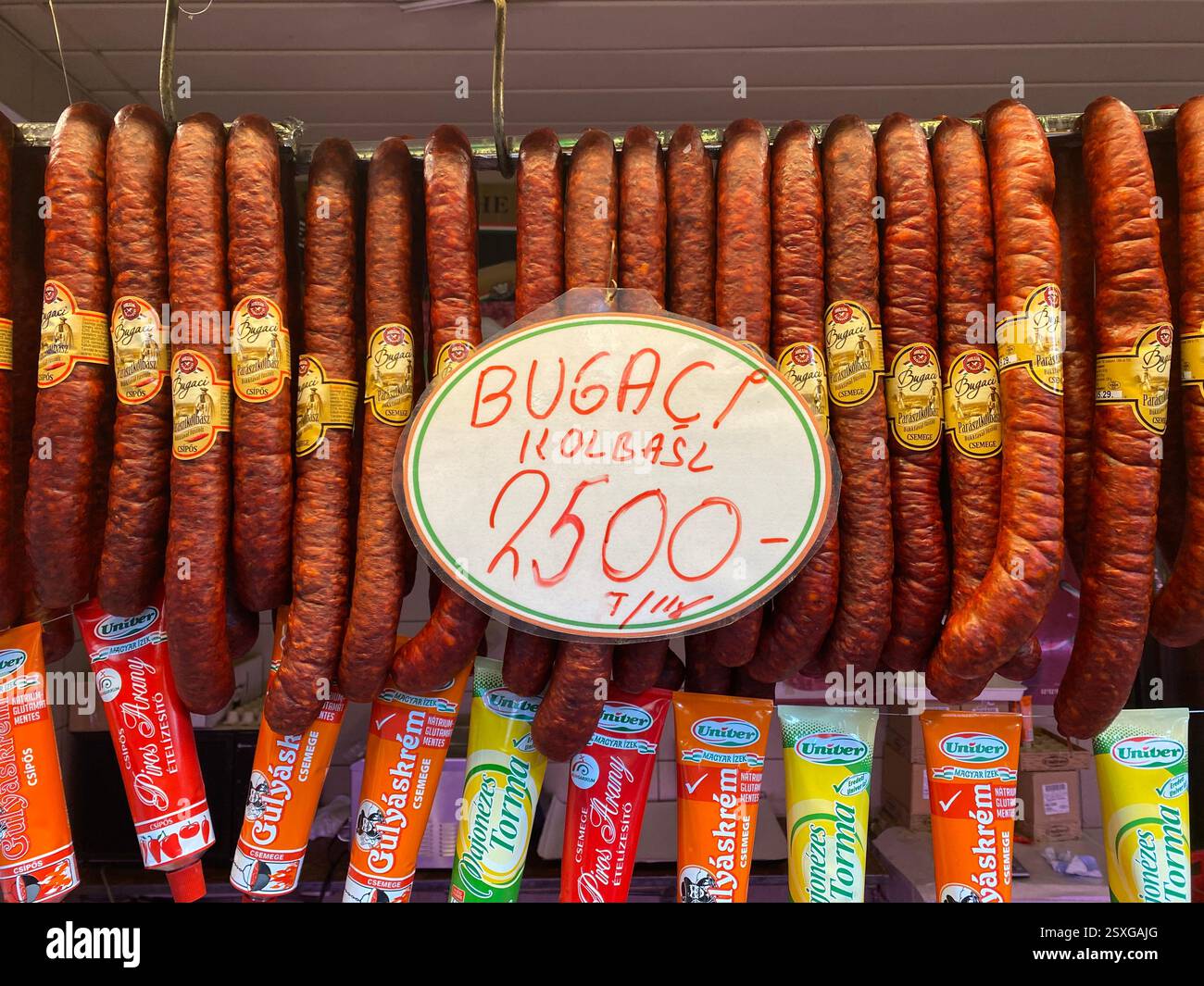 Hanging sausages in market in Hungary - Smartphone Captured Stock Image