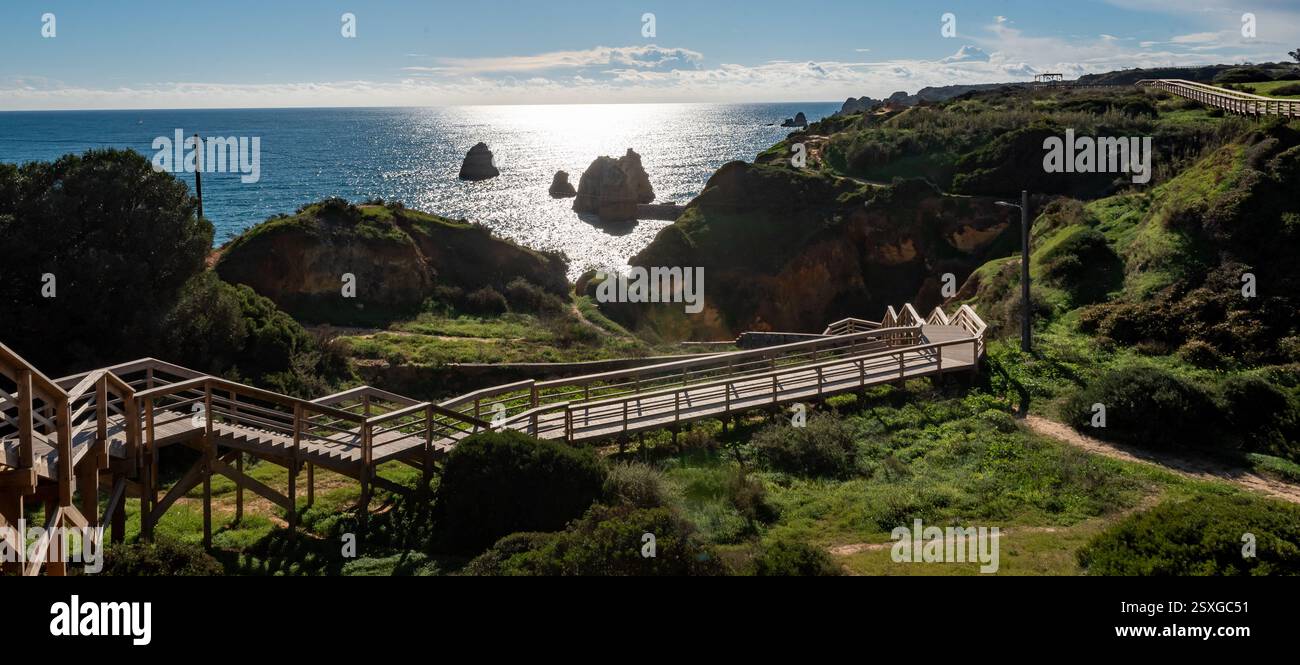 Baía dos Segredos, stairs going to empty beach near Lagos Portugal Stock Photo