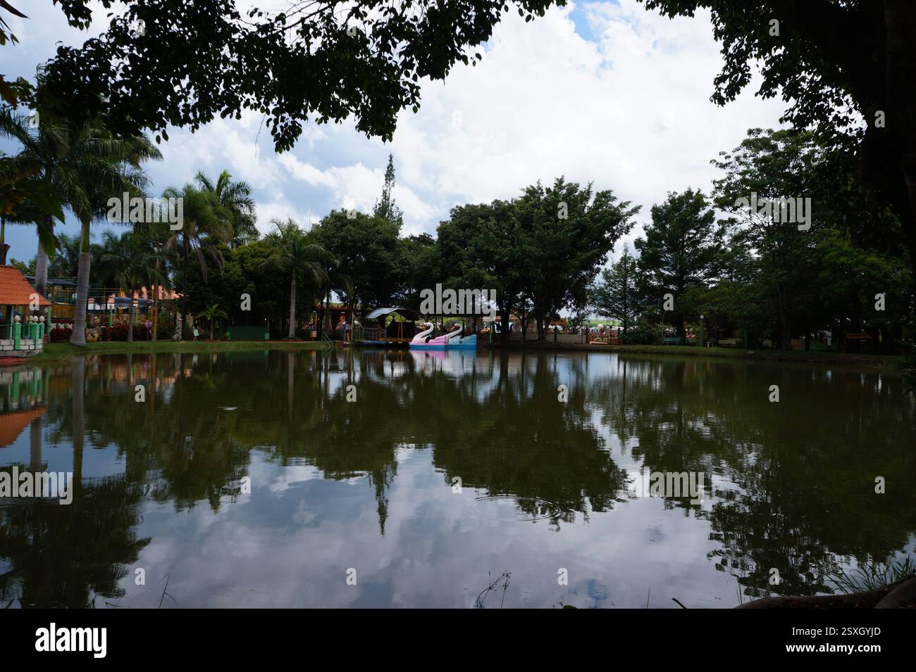 Small freshwater lake with water ride toy Stock Photo