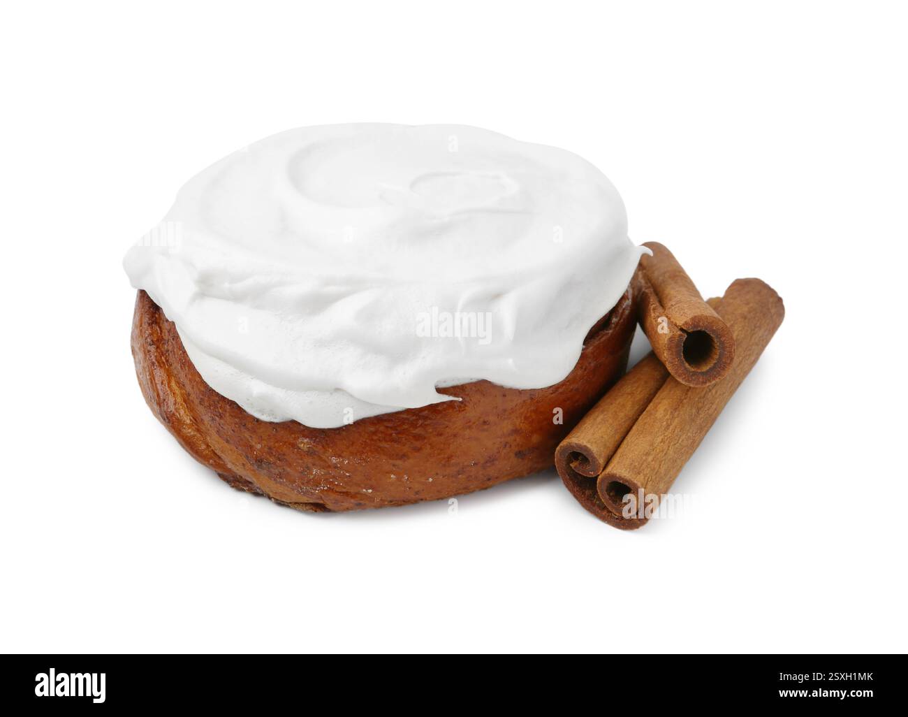 Tasty cinnamon roll with cream and spices isolated on white Stock Photo ...