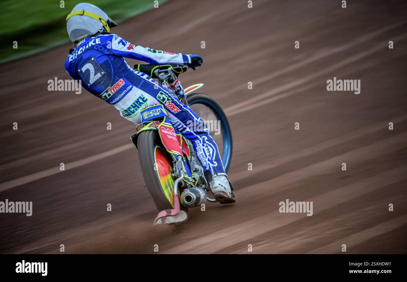 Motion Photo Of Australian Speedway Rider Tate Zishcke Powering Out Of A Bend At Glasgow Speedway Whilst Riding For Workington Comets Speedway Team Stock Photo