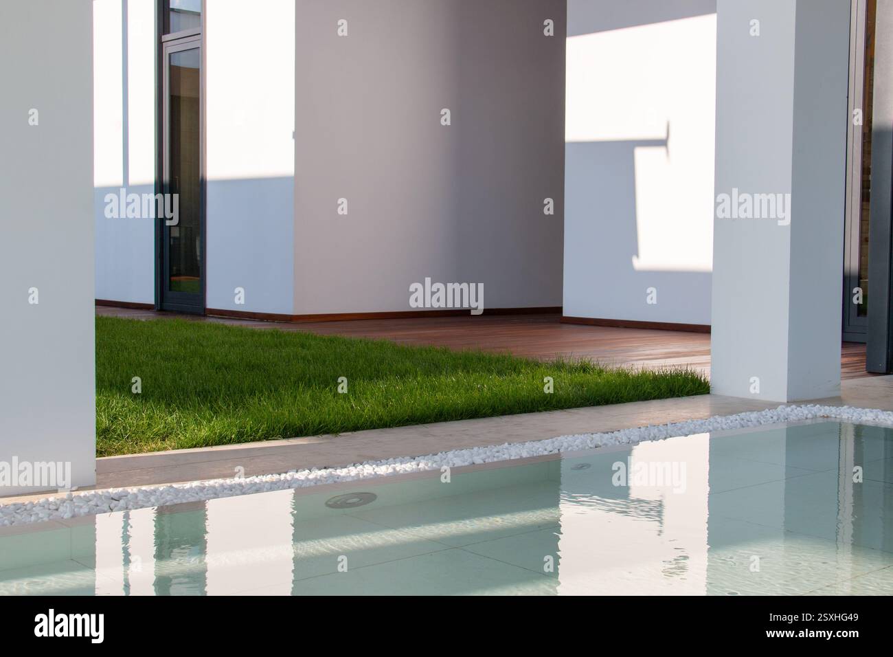 Minimalist architecture design close up of villa with atrium pond ...