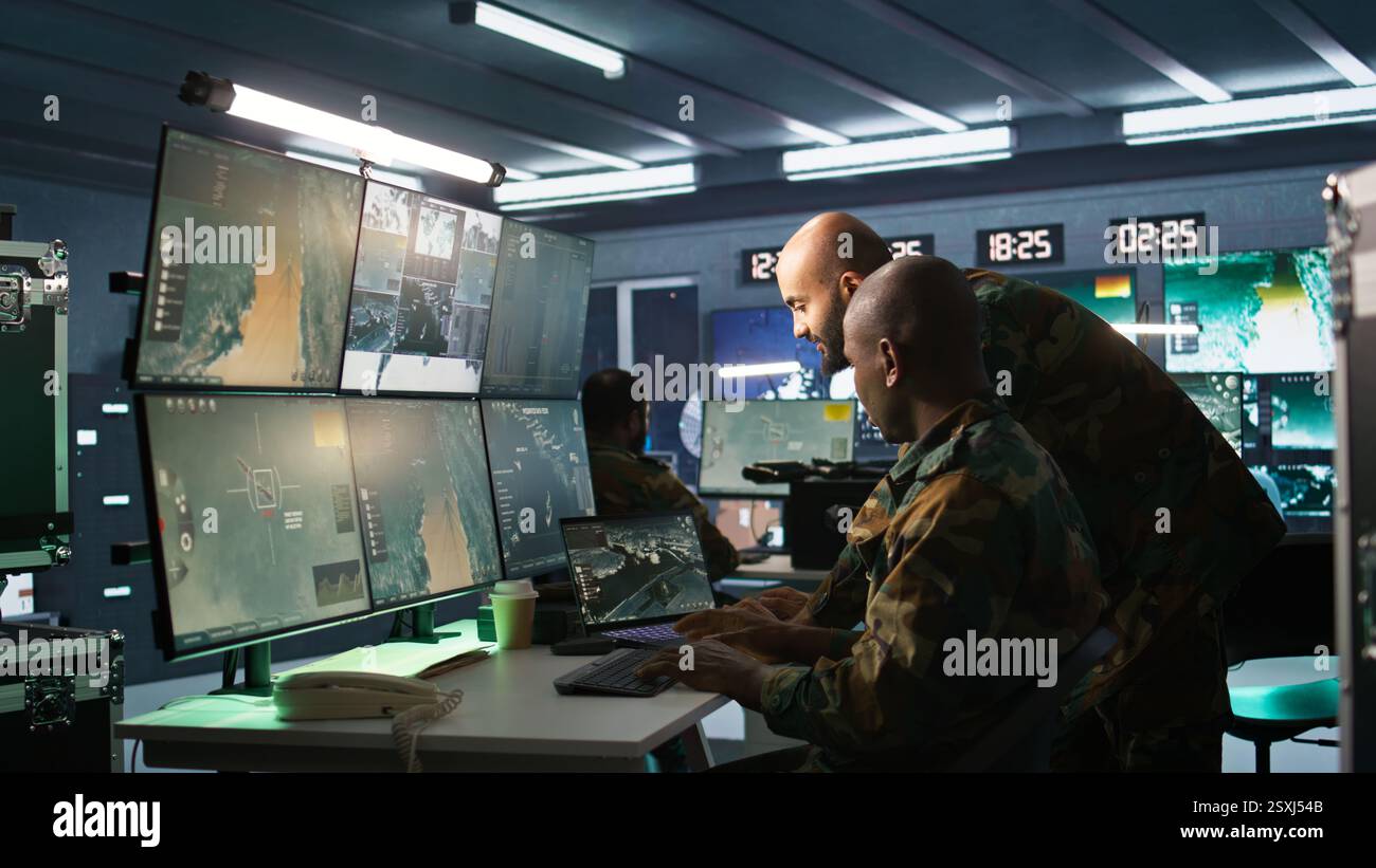 Military soldier in mission control center, overseeing national safety ...