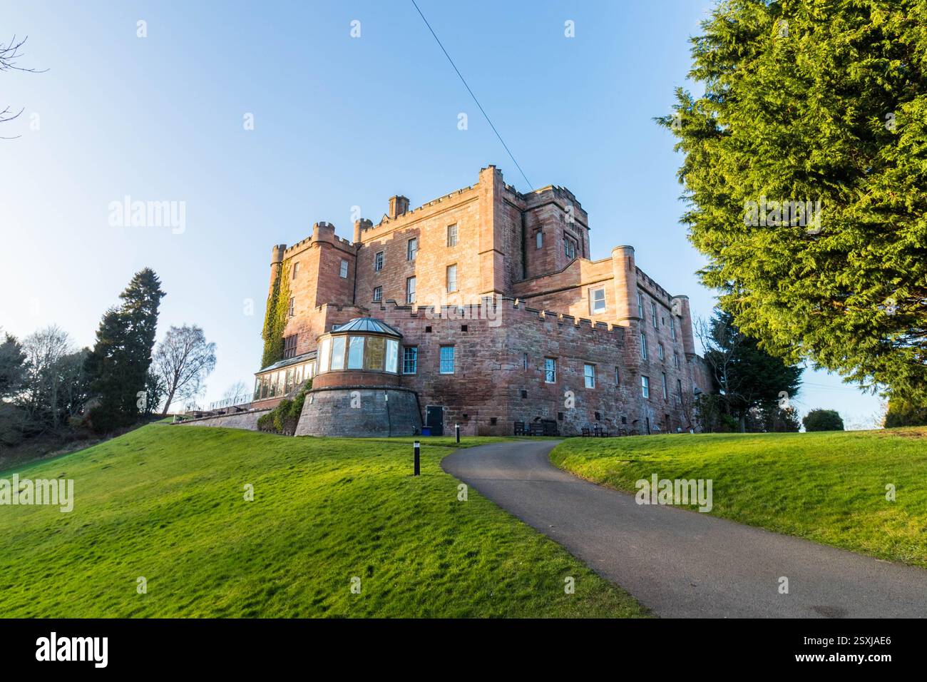 Dalhousie castle hotel in Cockpen, Midlothian, Scotland. Photo of the castle from the back with restaurant anex. Stock Photo