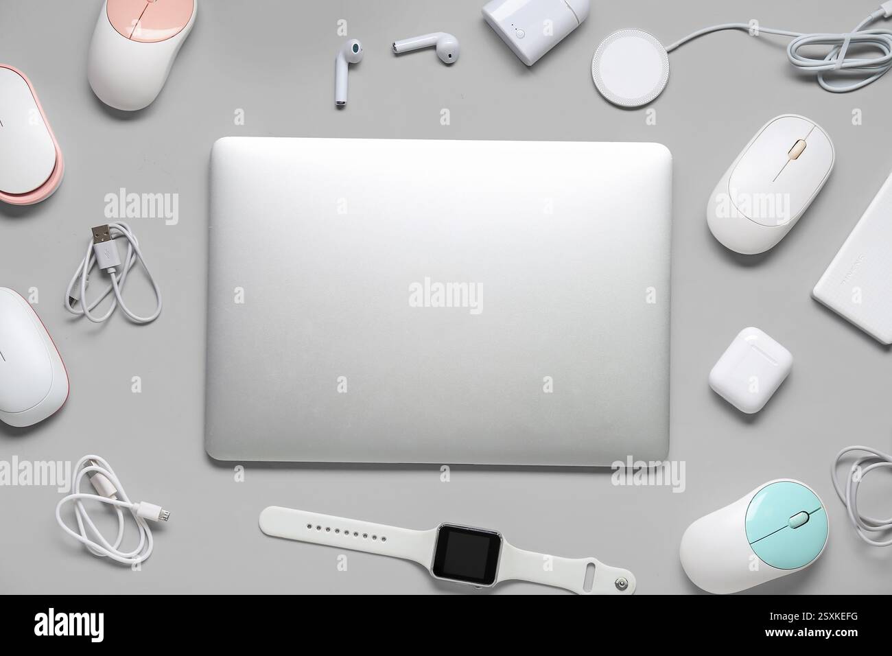 Composition with different modern gadgets on grey background Stock Photo