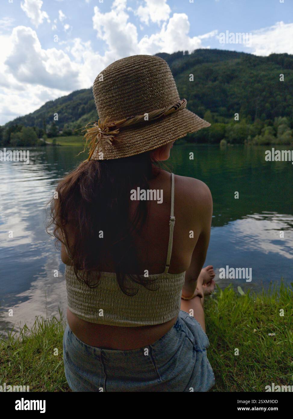 Girl on shore in straw hat hi-res stock photography and images - Alamy