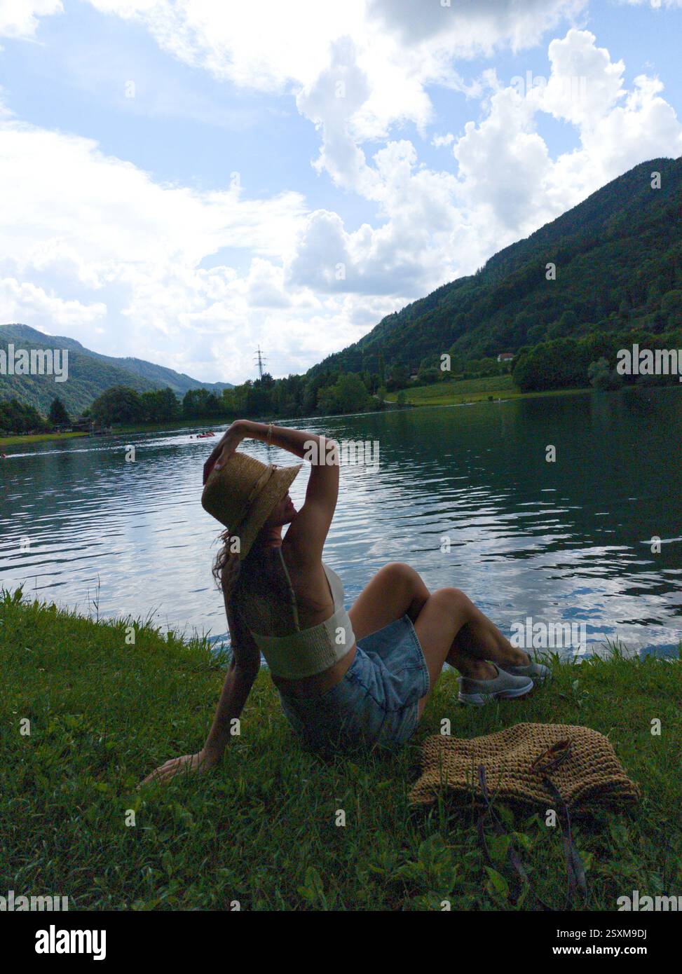 Girl on shore in straw hat hi-res stock photography and images - Alamy