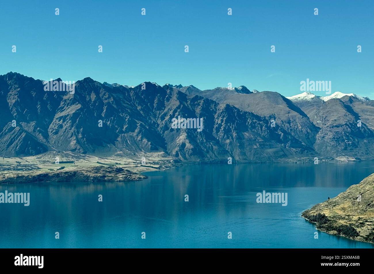Aerial photo from a small aeroplane of the Southern Alps between Queenstown and Milford Sound - Smartphone Captured Stock Image
