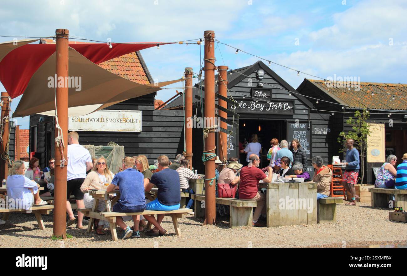 Southwold smokehouse and Sole Bay Fish Company, Blackshore, Southwold, Suffolk. Traditional smokehouse and eatery on Southwold harbour in summer. Stock Photo