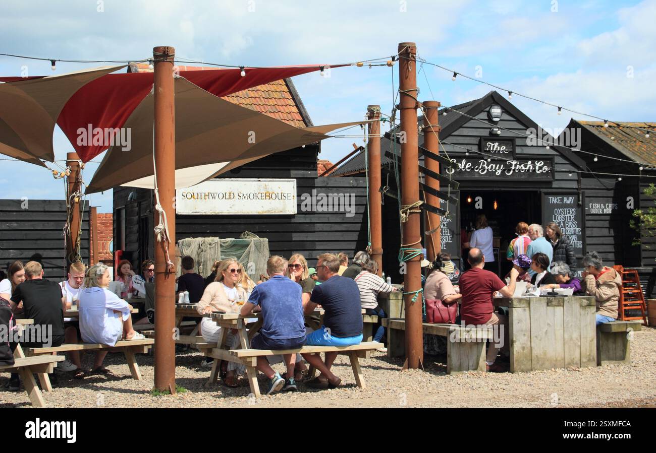 Southwold smokehouse and Sole Bay Fish Company, Blackshore, Southwold, Suffolk. Traditional smokehouse and eatery on Southwold harbour in summer. Stock Photo