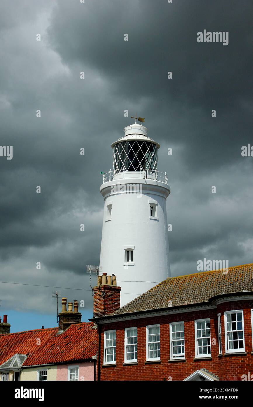Southwold lighthouse on a heavily clouded summer day. Southwold, Suffolk, East of England, UK. Stock Photo